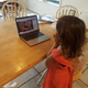 My niece watches a livestream of Lifechurch’s youth music offering, “Mr. Music,” in her “fancy dress.” (Image used with parental permission.)
